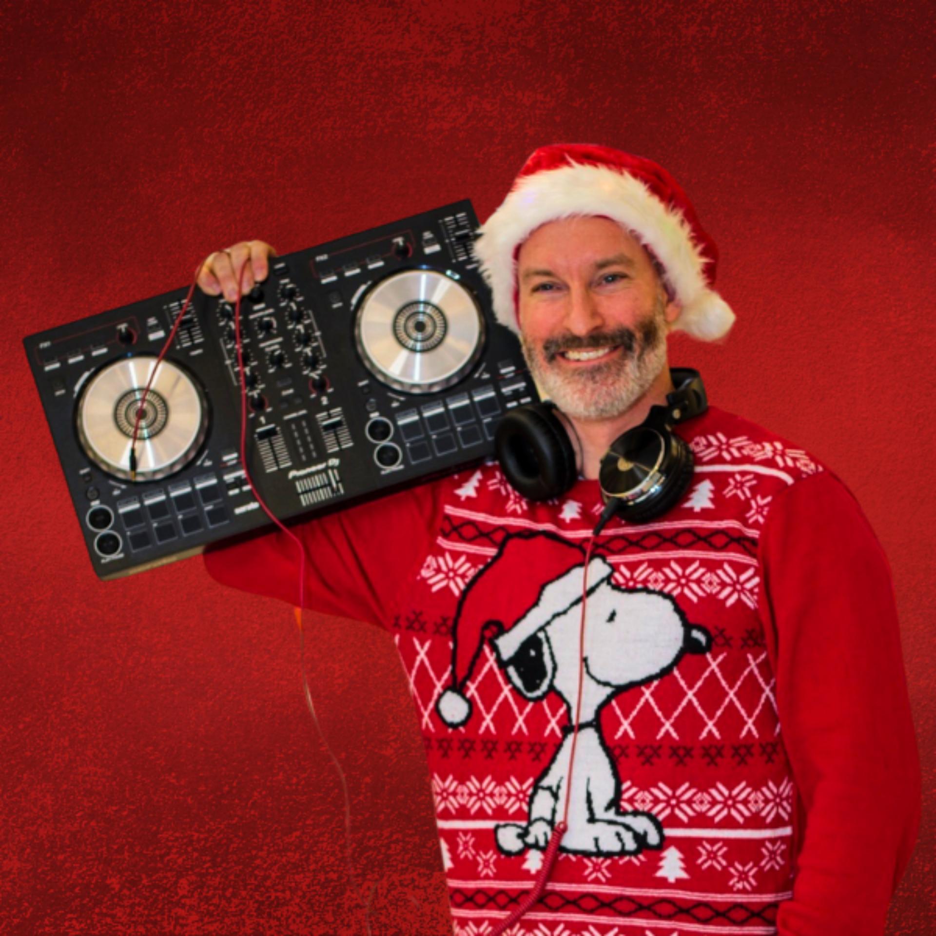 Smiling DJ in Christmas sweater